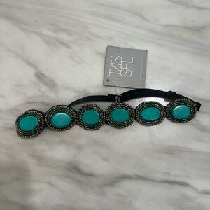 Black and turquoise headband from India.
